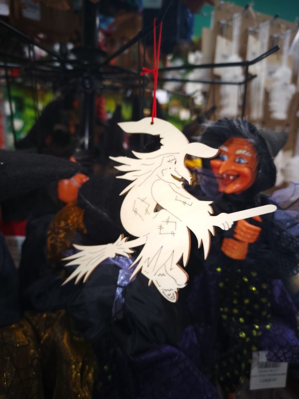 alt=wooden-ornament-witch