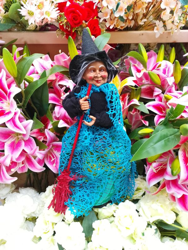 alt=kitchen-witch-doll-dora-teal