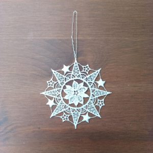 alt=lace-ornament-star-with-poinsettia-235271