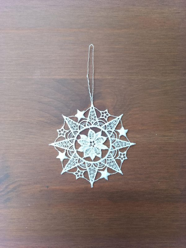 alt=lace-ornament-star-with-poinsettia-235271