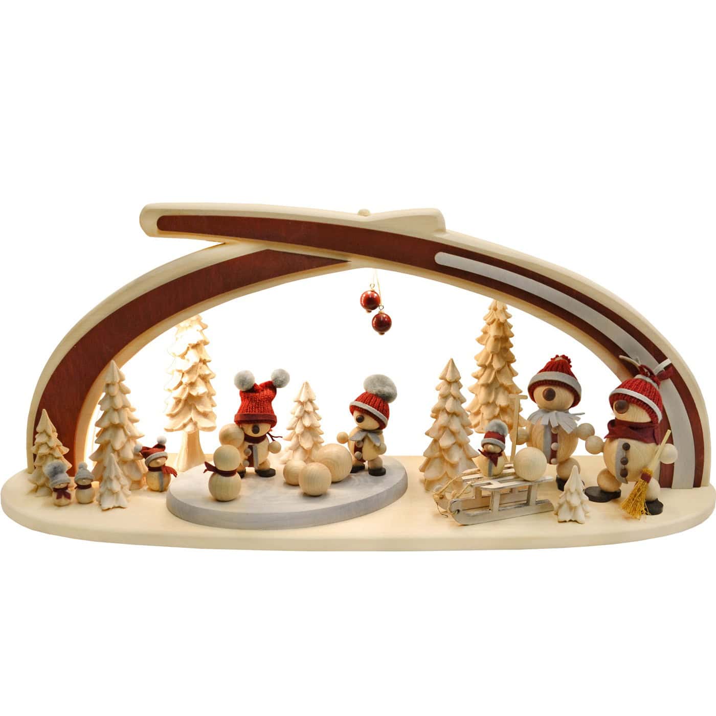 Wooden snowmen and trees Christmas decoration with arch and ornaments.